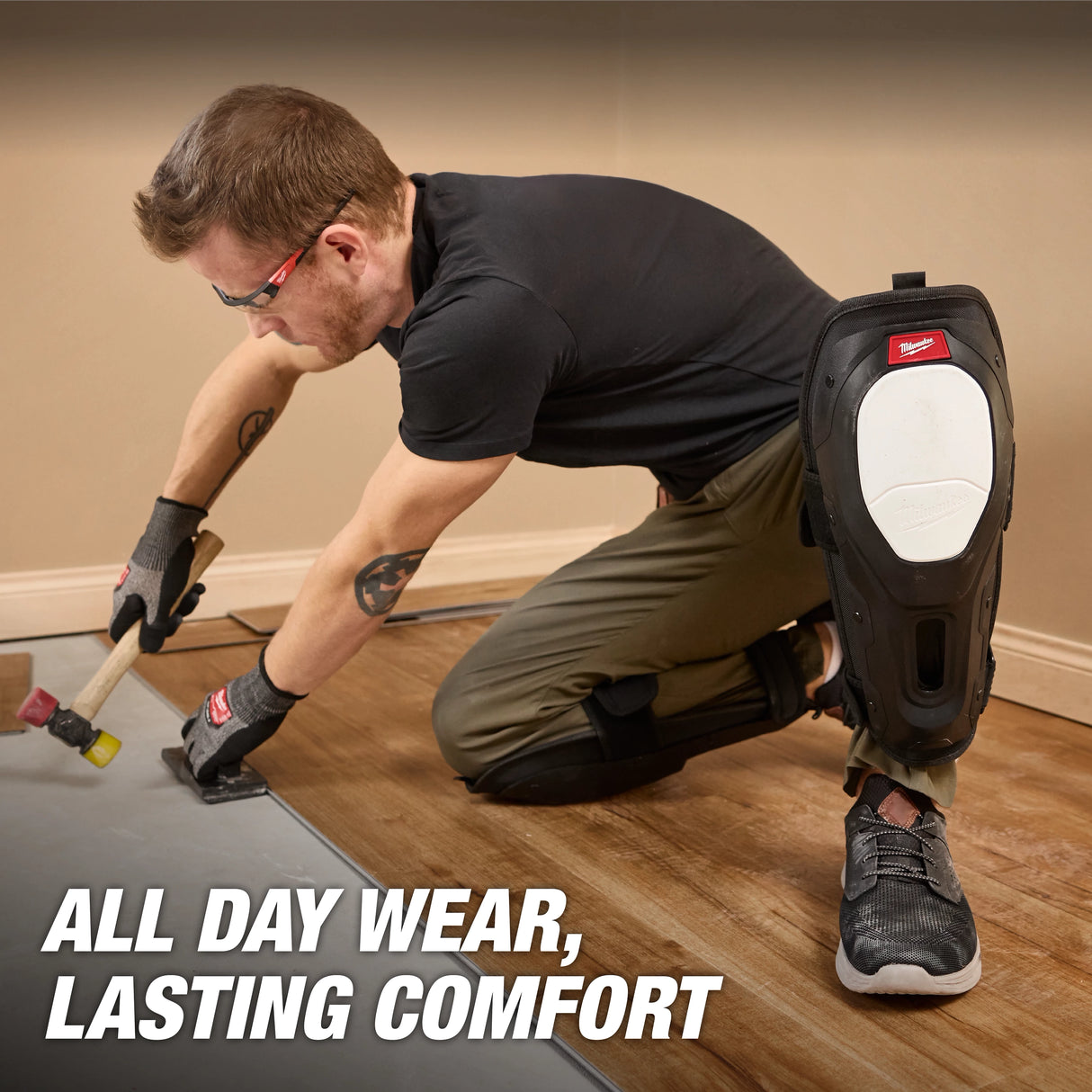Milwaukee Dynamic Flooring Knee Pad kneeling on floor panel