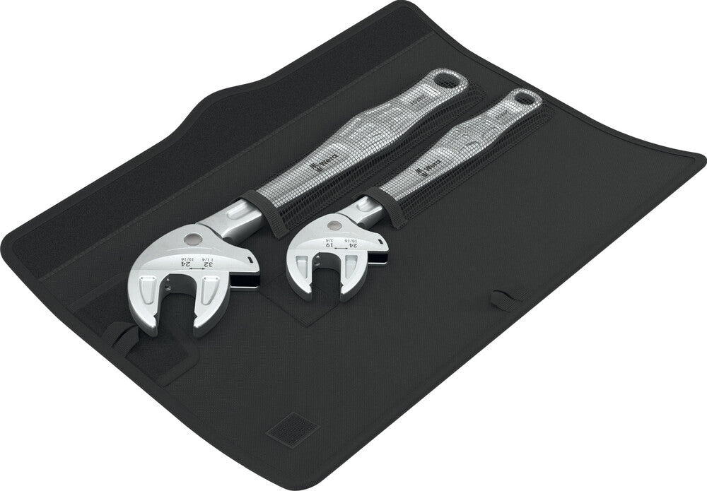 Set of Wera adjustable wrenches on a black mat with a white background