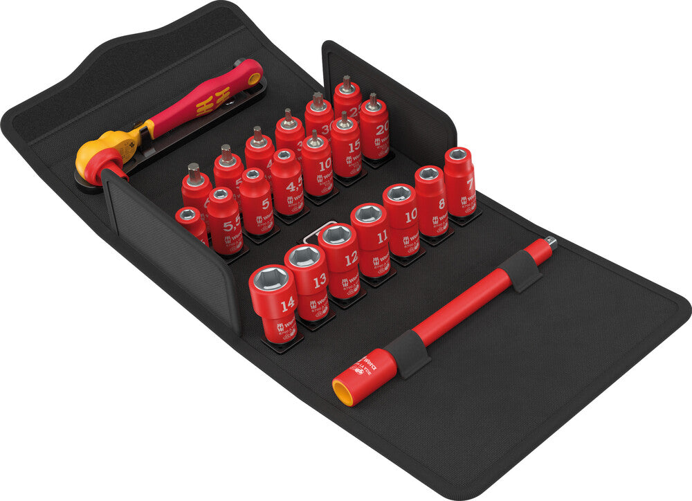 Set of red sockets and tools on a black mat with a white background
