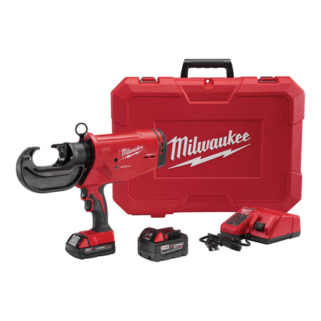 Milwaukee crimper with cordless cut-off tool, battery, and charger on a white background