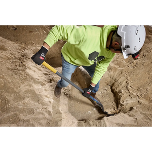 Worker digging with shovel wearing Milwaukee Cut Level 1 Nitrile Dipped Gloves