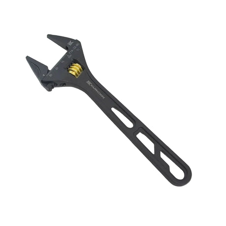 Black adjustable wrench on a light gray background