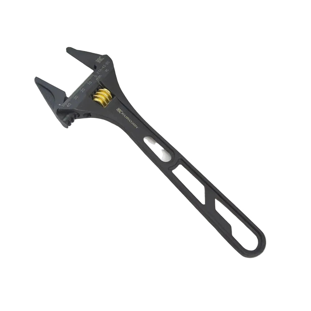 Black adjustable wrench on a light gray background