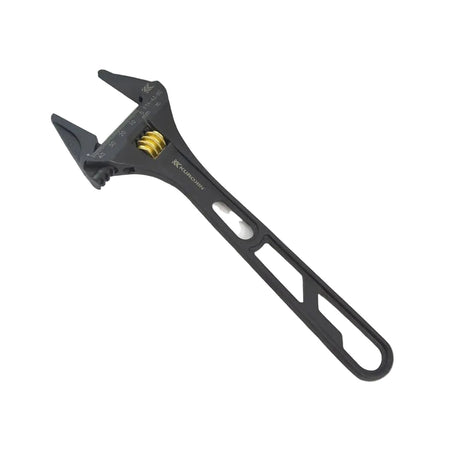 Black adjustable wrench on a light gray background