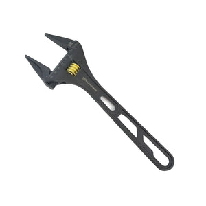 Black adjustable wrench on a light gray background